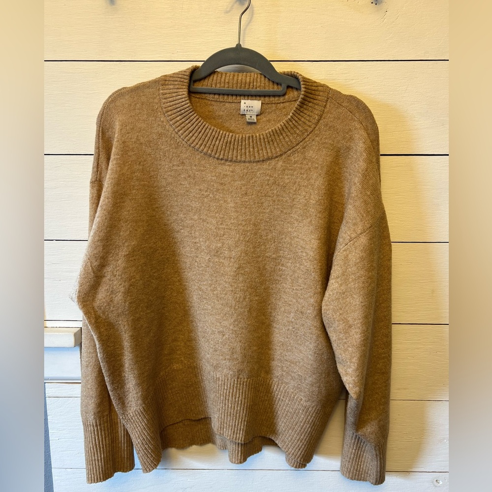 A New Day sweater